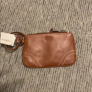 Coach wristlet whiskey brown